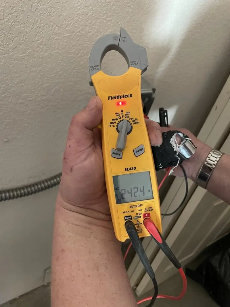 Voltage testing with clamp meter during Hot Tub / Pool Electrical Wiring in Willistown